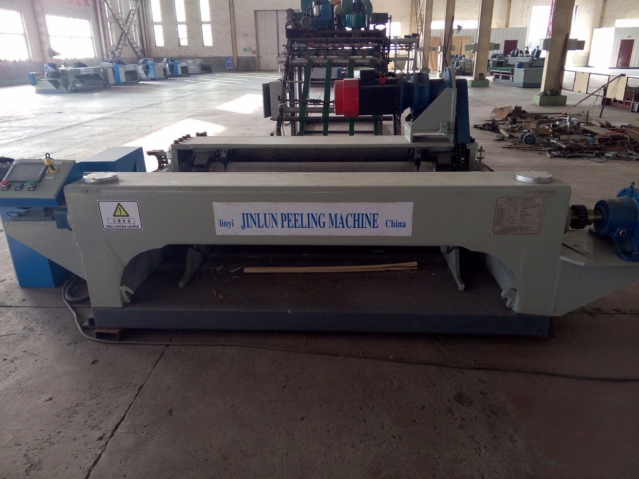 Máquina peladora de chapa de madera sin husillo para línea de producción de madera contrachapada